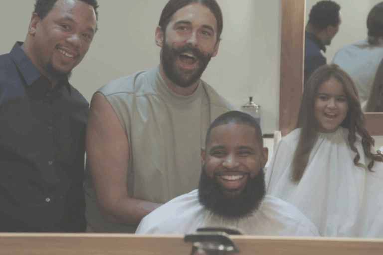 Wes in the barber's chair with the barber, Jonathan Van Ness, and his daughter, Nevaeh